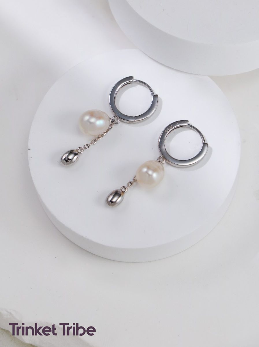 Elegant silver pearl drop hoop earrings with dangling freshwater pearls and small bead accents